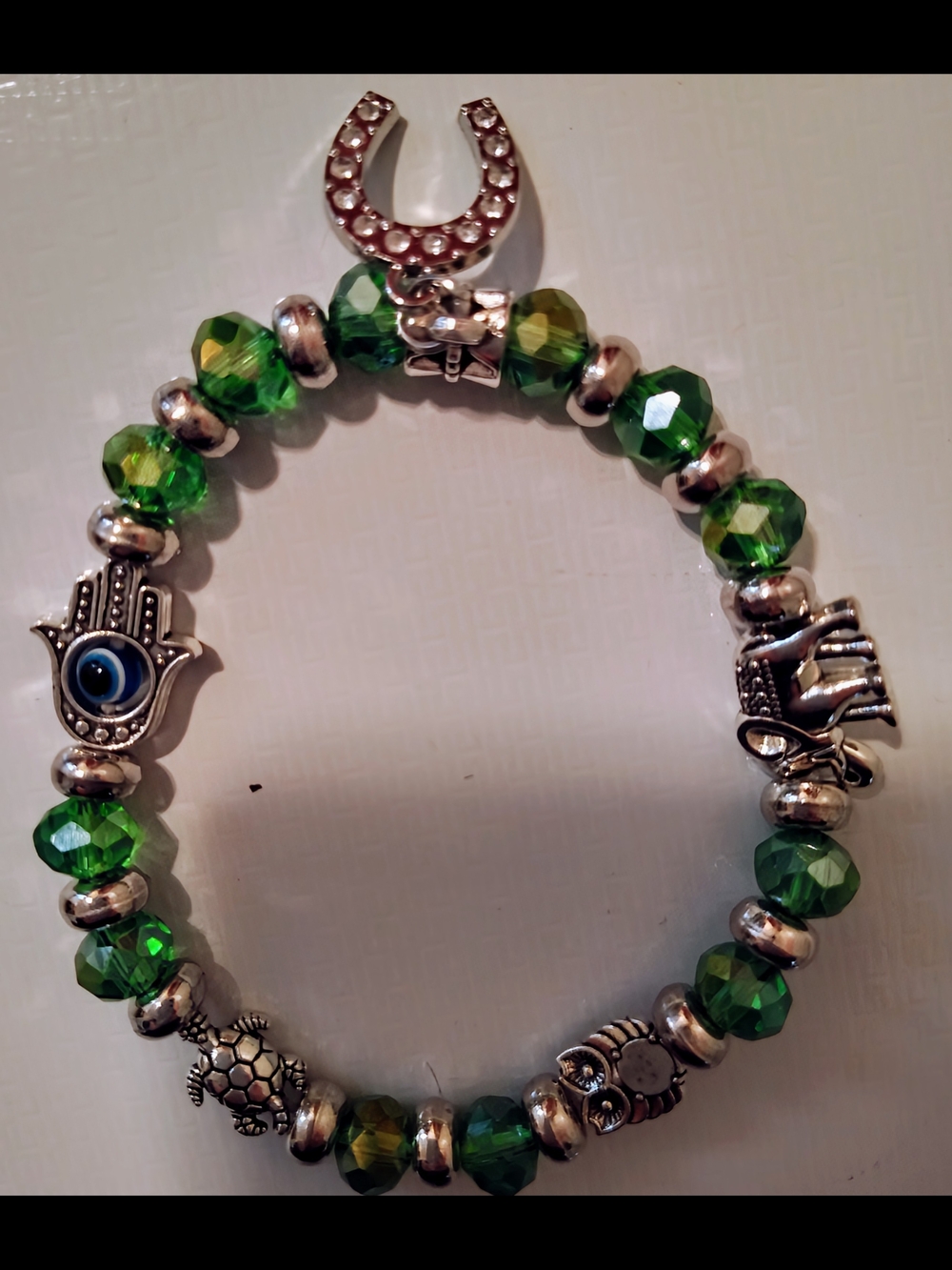 Green Beaded With Silver Charm Bracelet Stretchable with Charms.
